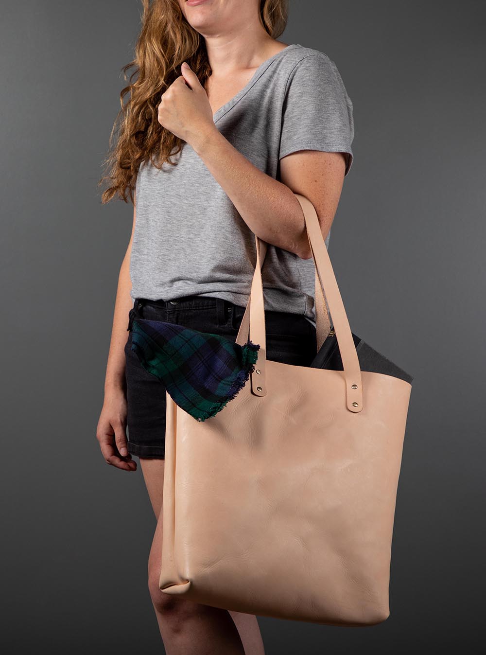 This veg tan leather tote has enough room for all your daily essentials.